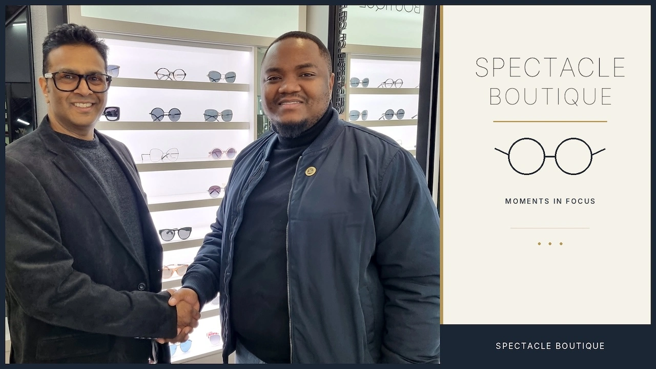 Naveen Pather and Mr. Monde Mshudulu shaking hands at Spectacle Boutique in South Africa